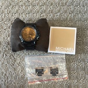 Black Michael Kors watch.